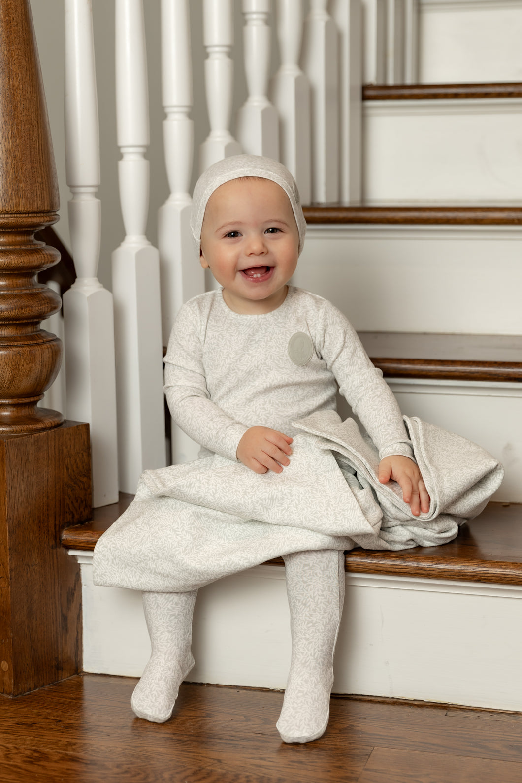 Floral crest layette set - powder blue