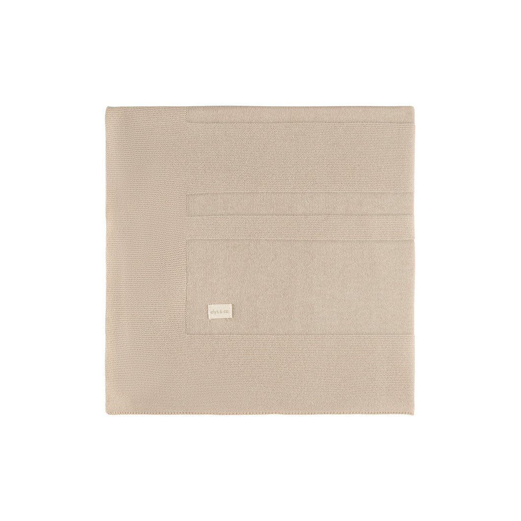Beige raised knit blanket