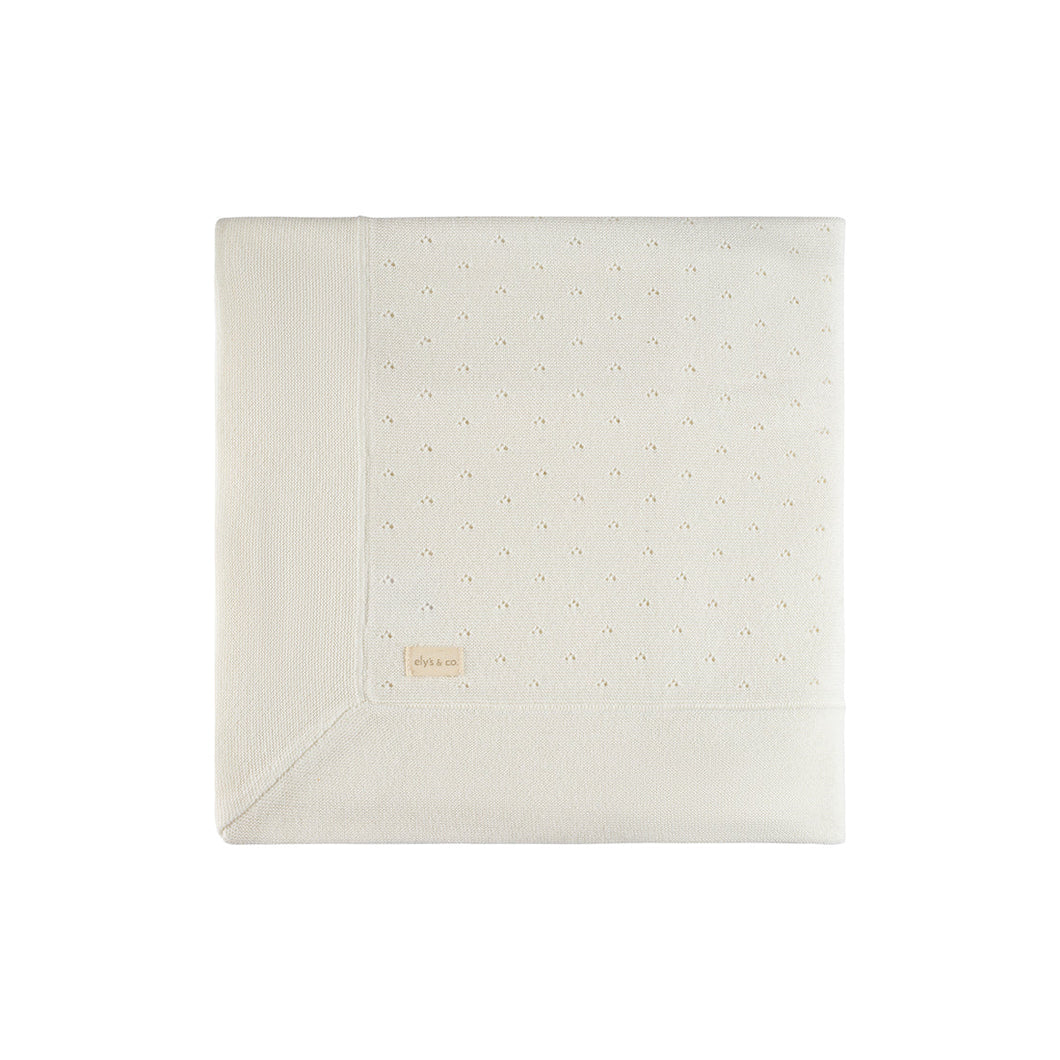 Cream pointelle knit blanket